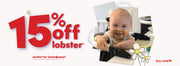 toddler sits in lobster highchair attached to kitchen bench - get 15% off lobster™ portable highchair